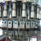 Zhangjiagang Automatic Bottle Water Semi Automatic Filling Liquid Filling Packing Machine